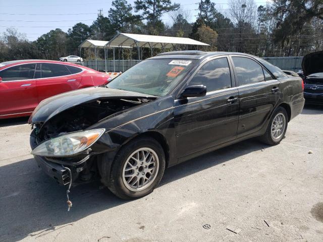 TOYOTA CAMRY LE 2003 with VIN 4T1BF32K03U044371 - Photo from auction