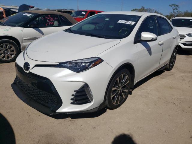 TOYOTA COROLLA L 2017 with VIN 5YFBURHE5HP614271 - Photo from auction
