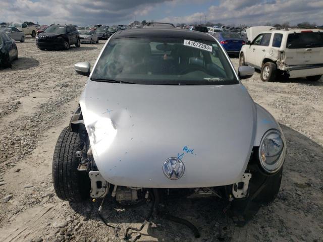 Photo 5 from auction – 2014 VOLKSWAGEN BEETLE with VIN 3VWJP7AT5EM625027