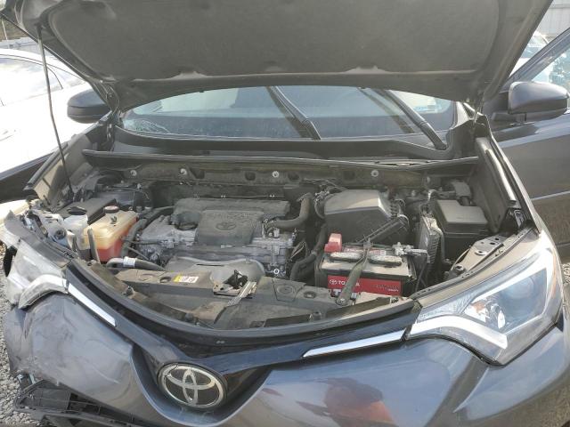 Photo 12 from auction – 2018 TOYOTA RAV4 LE with VIN JTMZFREV6JD129773