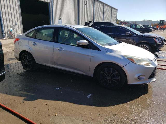 Photo 4 from auction – 2014 FORD FOCUS SE with VIN 1FADP3F29EL351704