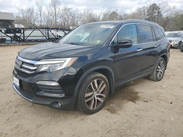HONDA PILOT TOUR 2017 with VIN 5FNYF5H99HB046747 - Photo from auction