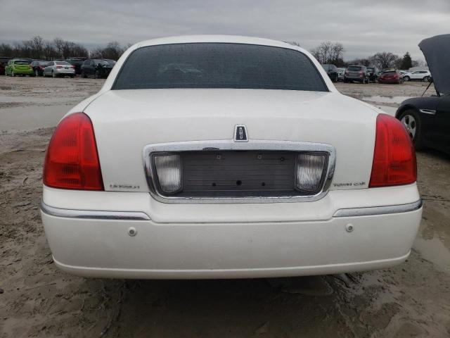 Photo 6 from auction – 2004 LINCOLN TOWN CAR E with VIN 1LNHM81W84Y610126
