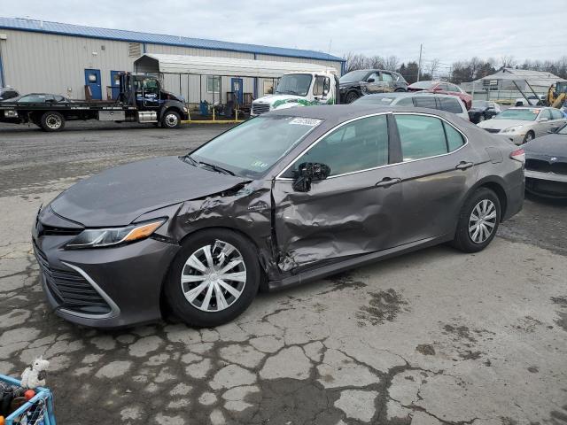 TOYOTA CAMRY LE 2021 with VIN 4T1C31AK2MU560719 - Photo from auction