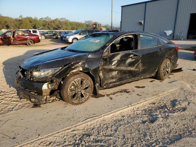 HONDA CIVIC EXL 2016 with VIN 19XFC1F76GE013090 - Photo from auction