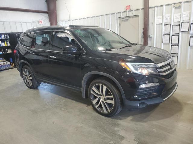 Photo 4 from auction – 2017 HONDA PILOT TOUR with VIN 5FNYF6H96HB066279
