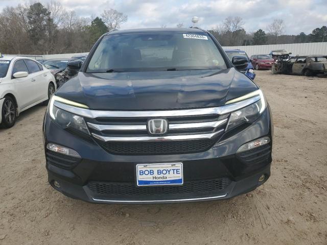 Photo 5 from auction – 2017 HONDA PILOT TOUR with VIN 5FNYF5H99HB046747