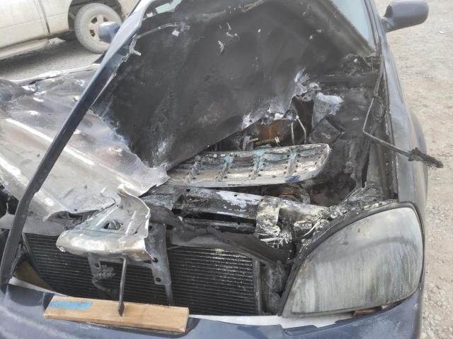 Photo 11 from auction – 2005 CADILLAC DEVILLE with VIN 1G6KD54Y75U111738