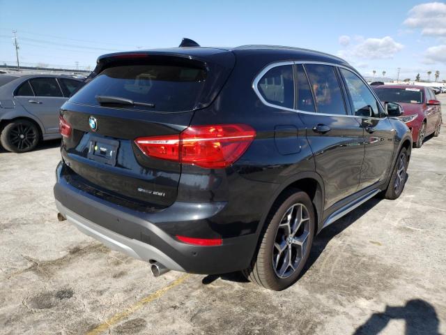 Photo 3 from auction – 2019 BMW X1 SDRIVE2 with VIN WBXHU7C52K3H45282