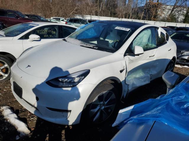 TESLA MODEL Y 2022 with VIN 7SAYGAEE3NF325827 - Photo from auction