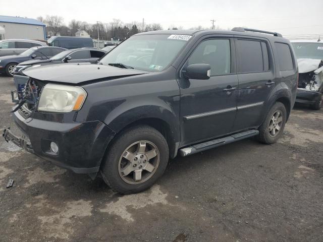 HONDA PILOT TOUR 2010 with VIN 5FNYF4H85AB030665 - Photo from auction
