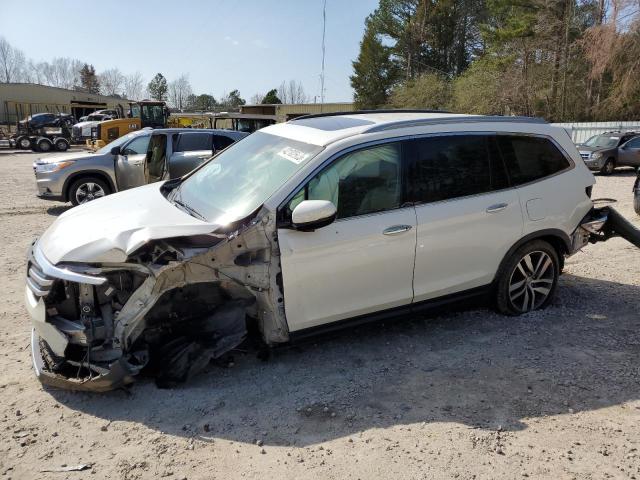HONDA PILOT TOUR 2016 with VIN 5FNYF6H91GB106525 - Photo from auction
