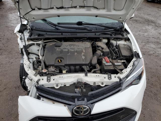 Photo 11 from auction – 2018 TOYOTA COROLLA L with VIN 5YFBURHEXJP826797