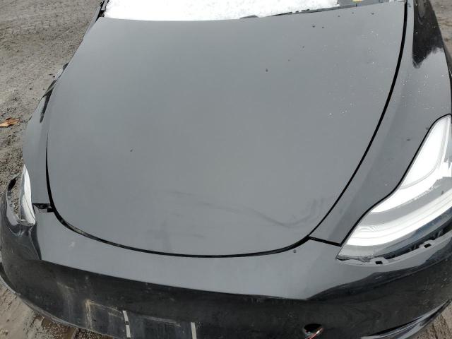 Photo 11 from auction – 2020 TESLA MODEL Y with VIN 5YJYGDEE1LF014828