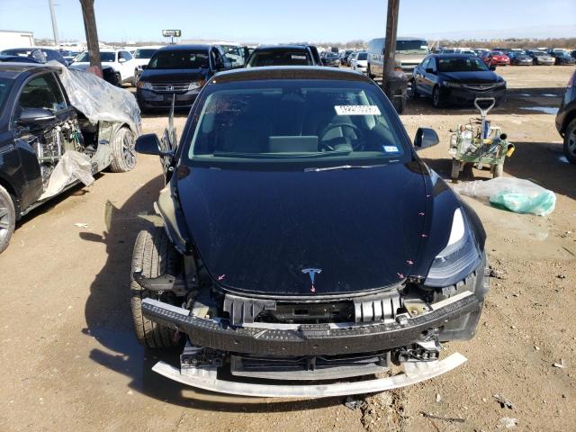 Photo 5 from auction – 2021 TESLA MODEL 3 with VIN 5YJ3E1EA0MF089694