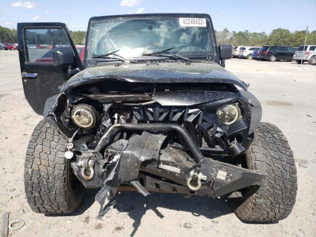 Photo 5 from auction – 2015 JEEP WRANGLER U with VIN 1C4BJWDG4FL658685