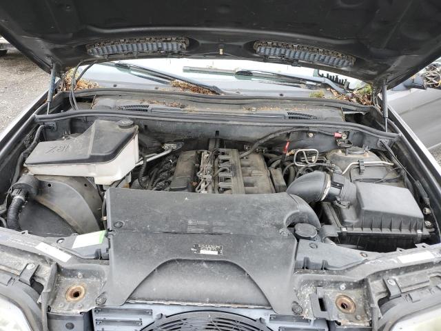 Photo 12 from auction – 2006 BMW X5 3.0I with VIN 5UXFA13586LY27996