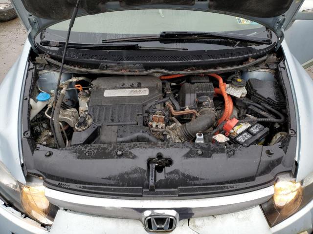 Photo 11 from auction – 2006 HONDA CIVIC HYBR with VIN JHMFA36246S014299