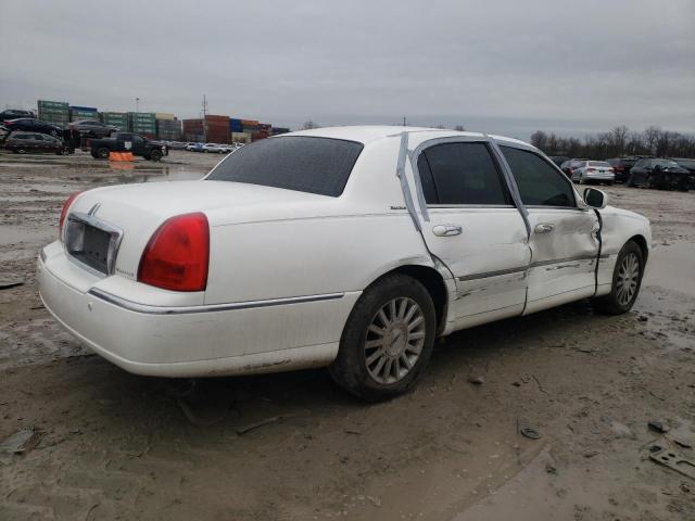Photo 3 from auction – 2004 LINCOLN TOWN CAR E with VIN 1LNHM81W84Y610126