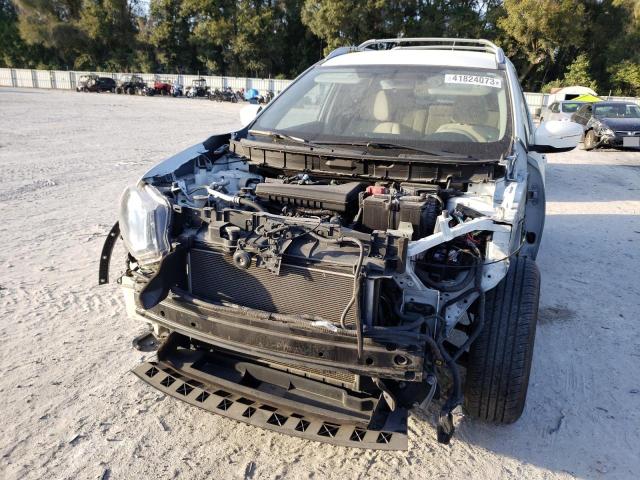 Photo 5 from auction – 2015 NISSAN ROGUE S with VIN KNMAT2MTXFP574018