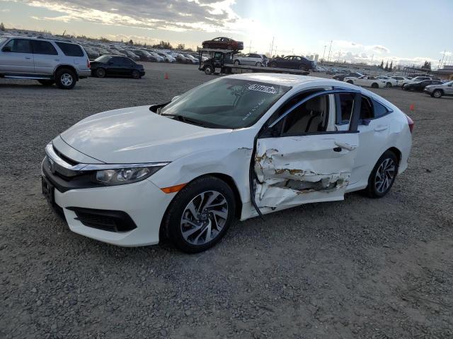 HONDA CIVIC EX 2018 with VIN 2HGFC2F70JH510106 - Photo from auction