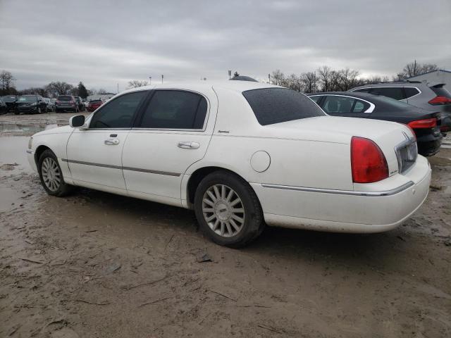 Photo 2 from auction – 2004 LINCOLN TOWN CAR E with VIN 1LNHM81W84Y610126