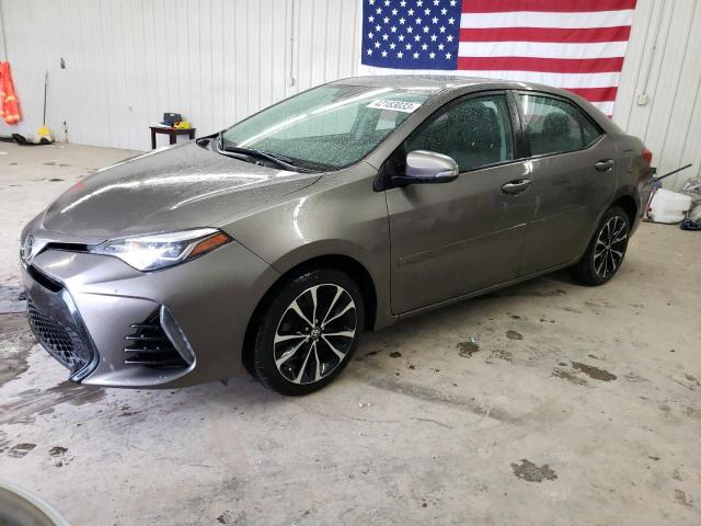 TOYOTA COROLLA L 2017 with VIN 2T1BURHE7HC869603 - Photo from auction