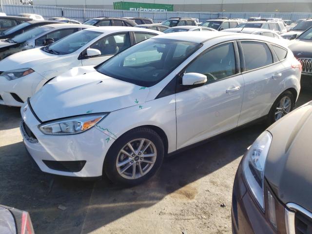FORD FOCUS SE 2015 with VIN 1FADP3K29FL349443 - Photo from auction
