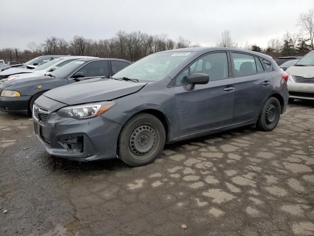SUBARU IMPREZA 2019 with VIN 4S3GTAA66K3755153 - Photo from auction