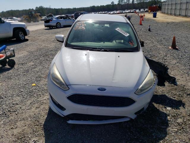 Photo 5 from auction – 2015 FORD FOCUS SE with VIN 1FADP3FE4FL321554