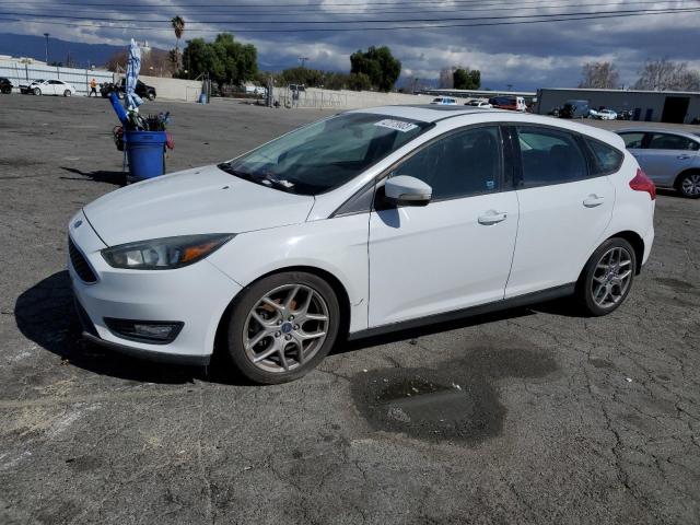 FORD FOCUS SE 2015 with VIN 1FADP3K29FL330259 - Photo from auction