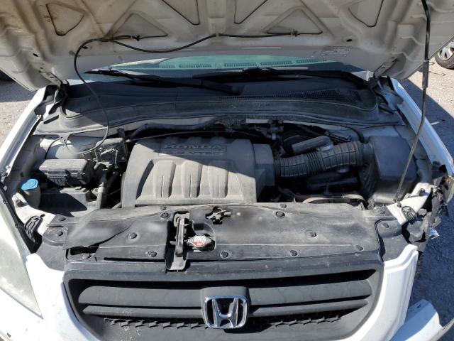 Photo 12 from auction – 2005 HONDA PILOT with VIN 2HKYF18655H550241