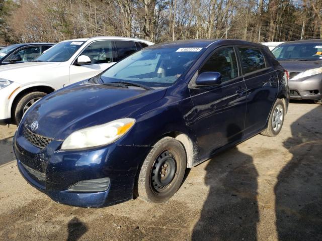TOYOTA COROLLA MA 2009 with VIN 2T1KU40E29C158102 - Photo from auction
