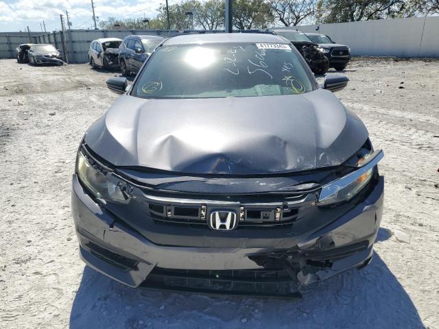 Photo 5 from auction – 2018 HONDA CIVIC LX with VIN 2HGFC2F52JH560665