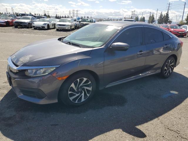 HONDA CIVIC EX 2016 with VIN 2HGFC2F75GH553123 - Photo from auction