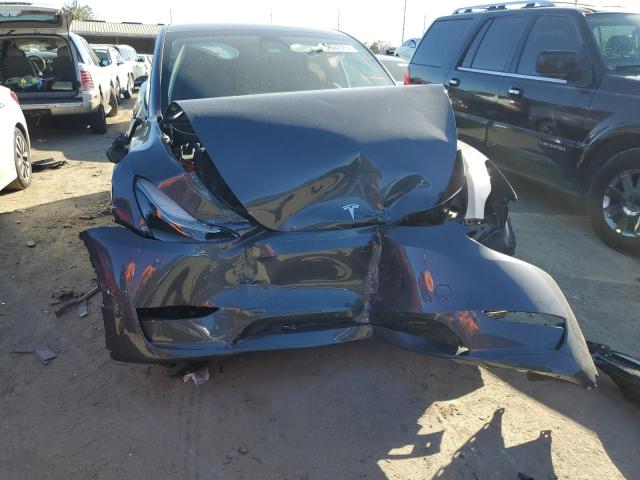 Photo 5 from auction – 2023 TESLA MODEL Y with VIN 7SAYGDEE0PF615074