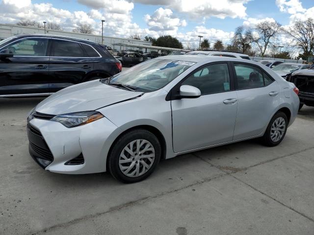 TOYOTA COROLLA L 2017 with VIN 5YFBURHE0HP582491 - Photo from auction