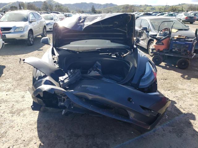 Photo 5 from auction – 2022 TESLA MODEL 3 with VIN 5YJ3E1EA4NF142964