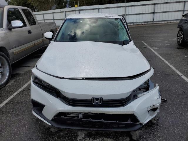 Photo 5 from auction – 2022 HONDA CIVIC LX with VIN 2HGFE2F27NH533368