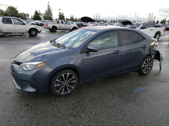 TOYOTA COROLLA L 2015 with VIN 5YFBURHE6FP296142 - Photo from auction