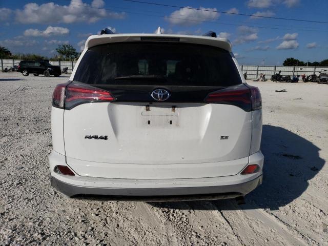Photo 6 from auction – 2018 TOYOTA RAV4 SE with VIN 2T3NFREV4JW421259