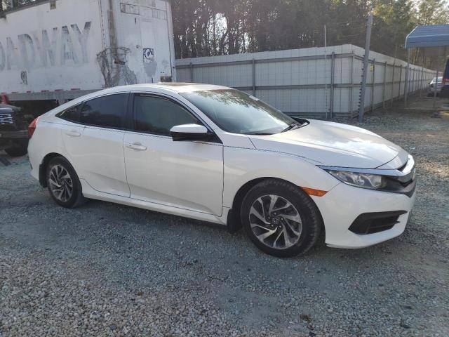 Photo 4 from auction – 2018 HONDA CIVIC EX with VIN 19XFC2F75JE007682