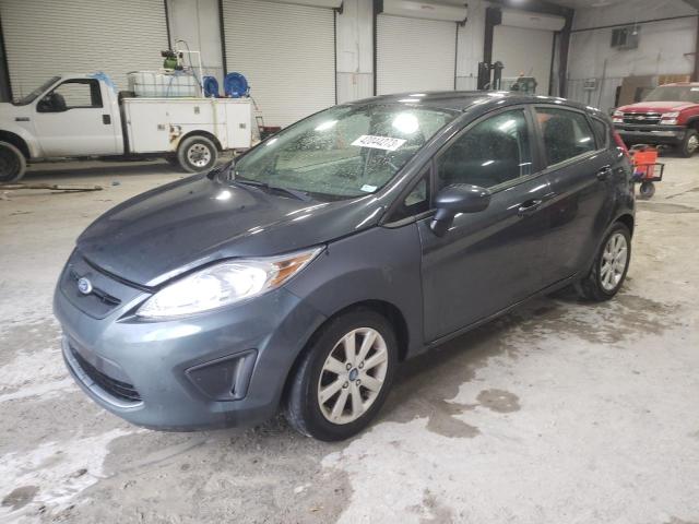 FORD FIESTA SE 2011 with VIN 3FADP4EJ8BM180470 - Photo from auction
