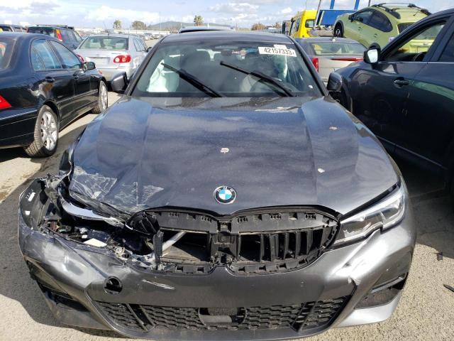 Photo 5 from auction – 2021 BMW 330I with VIN 3MW5R1J0XM8B69063