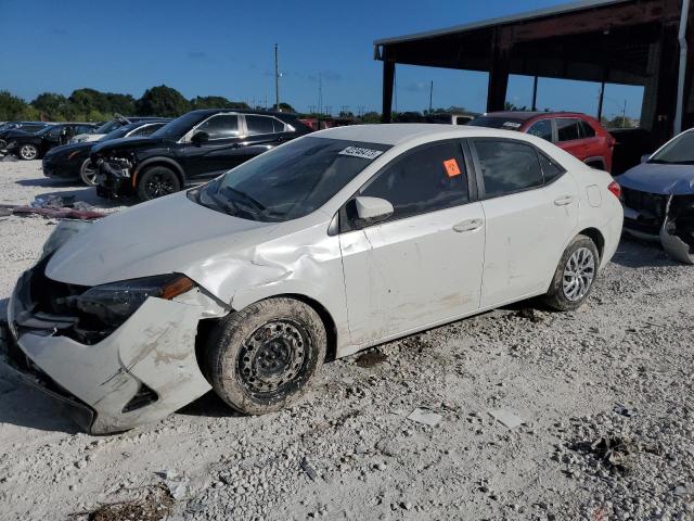 TOYOTA COROLLA L 2019 with VIN 5YFBURHE6KP896637 - Photo from auction