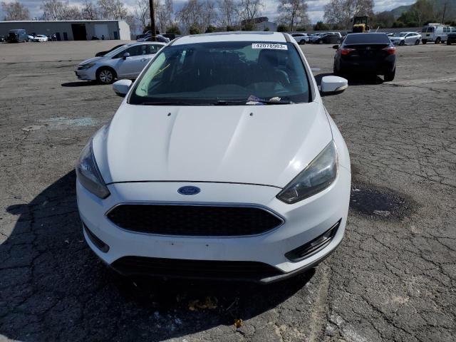 Photo 5 from auction – 2015 FORD FOCUS SE with VIN 1FADP3K29FL330259