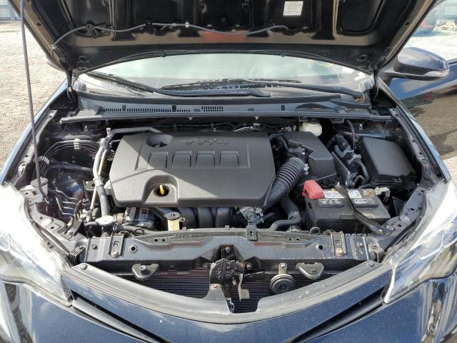 Photo 11 from auction – 2018 TOYOTA COROLLA L with VIN 2T1BURHE9JC104012