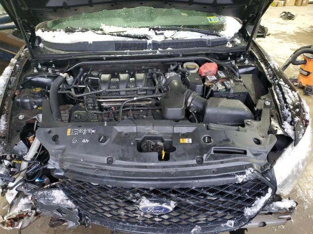 Photo 11 from auction – 2014 FORD TAURUS POL with VIN 1FAHP2MK2EG111725