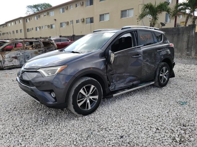 TOYOTA RAV4 XLE 2016 with VIN 2T3WFREV9GW296451 - Photo from auction