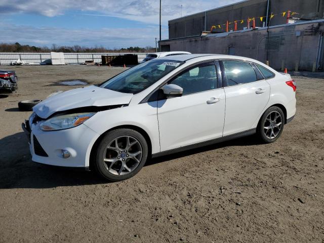 FORD FOCUS SE 2013 with VIN 1FADP3F29DL230010 - Photo from auction